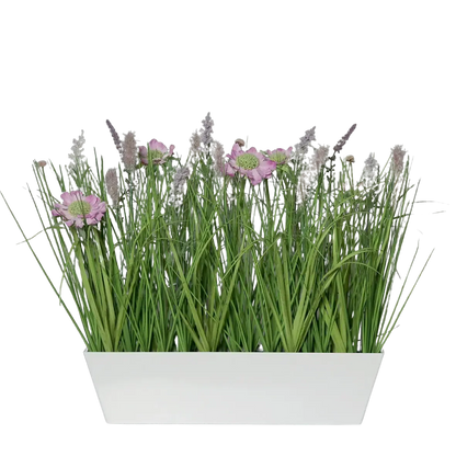 Hochwertiges Kunstgras auf transparentem Hintergrund mit echt wirkenden Kunstblättern in natürlicher Anordnung. Künstliches Wiesenblumensortiment - Kunzang hat die Farbe Pink und ist 41 cm hoch. | aplanta Kunstpflanzen